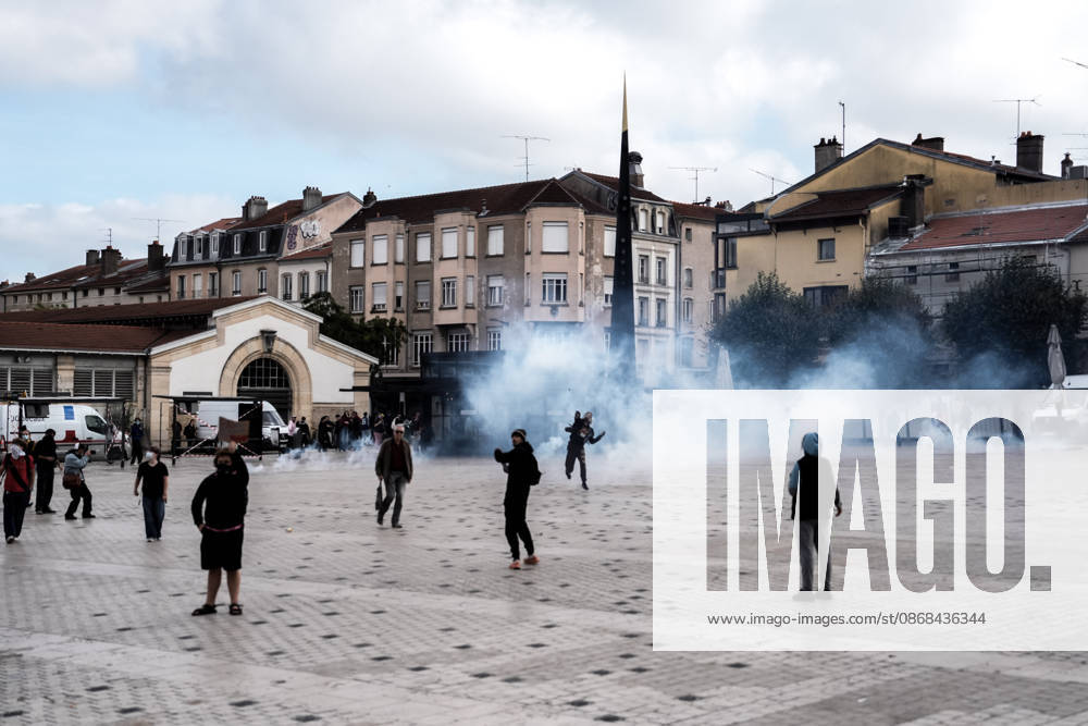 Students clash with police during high-school mobilization in Nancy NANCY, FRANCE - OCTOBER 2: Students clash with security forces as nationwide high-school mobilization continues over school conditions and demands for greater education resources in Nancy, France on October 2, 2026. Law enforcement officers used tear gas to disperse student crowds protesting across multiple school locations as part of nationwide mobilizations over education resources and school conditions. Police deploy security units around several locations as demonstrations and blockades continue. Muhammed Said Tako Anadolu Nancy France. Editorial use only. Please get in touch for any other usage.