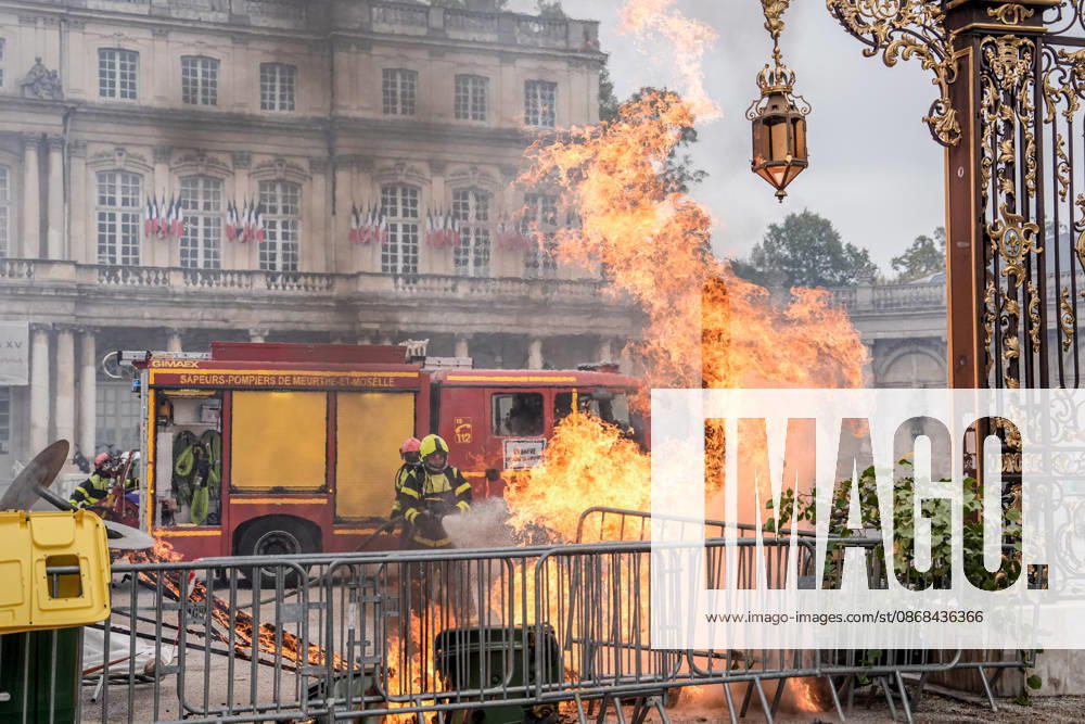 Students clash with police during high-school mobilization in Nancy NANCY, FRANCE - OCTOBER 2: Firefighters work to extinguish flames rising from burning barricades erected by high school students during nationwide education protests Nancy, France on October 2, 2026. Students gather around several schools and clash with police forces as a nationwide high-school mobilization continues over school conditions and demands for greater education resources in Nancy. Police deploy security units around several locations as demonstrations and blockades continue. Muhammed Said Tako Anadolu Nancy France. Editorial use only. Please get in touch for any other usage.