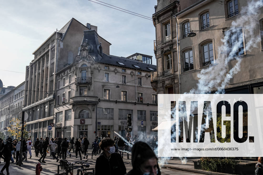 Students clash with police during high-school mobilization in Nancy NANCY, FRANCE - OCTOBER 2: Students clash with security forces as nationwide high-school mobilization continues over school conditions and demands for greater education resources in Nancy, France on October 2, 2026. Law enforcement officers used tear gas to disperse student crowds protesting across multiple school locations as part of nationwide mobilizations over education resources and school conditions. Police deploy security units around several locations as demonstrations and blockades continue. Muhammed Said Tako Anadolu Nancy France. Editorial use only. Please get in touch for any other usage.