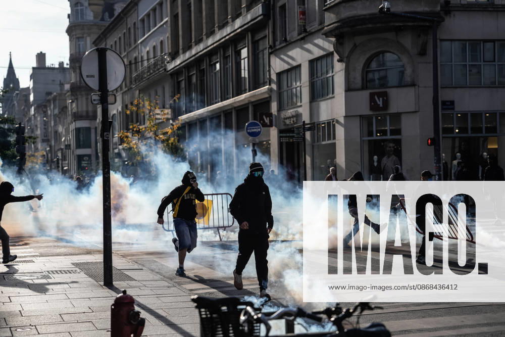Students clash with police during high-school mobilization in Nancy NANCY, FRANCE - OCTOBER 2: Students clash with security forces as nationwide high-school mobilization continues over school conditions and demands for greater education resources in Nancy, France on October 2, 2026. Law enforcement officers used tear gas to disperse student crowds protesting across multiple school locations as part of nationwide mobilizations over education resources and school conditions. Police deploy security units around several locations as demonstrations and blockades continue. Muhammed Said Tako Anadolu Nancy France. Editorial use only. Please get in touch for any other usage.