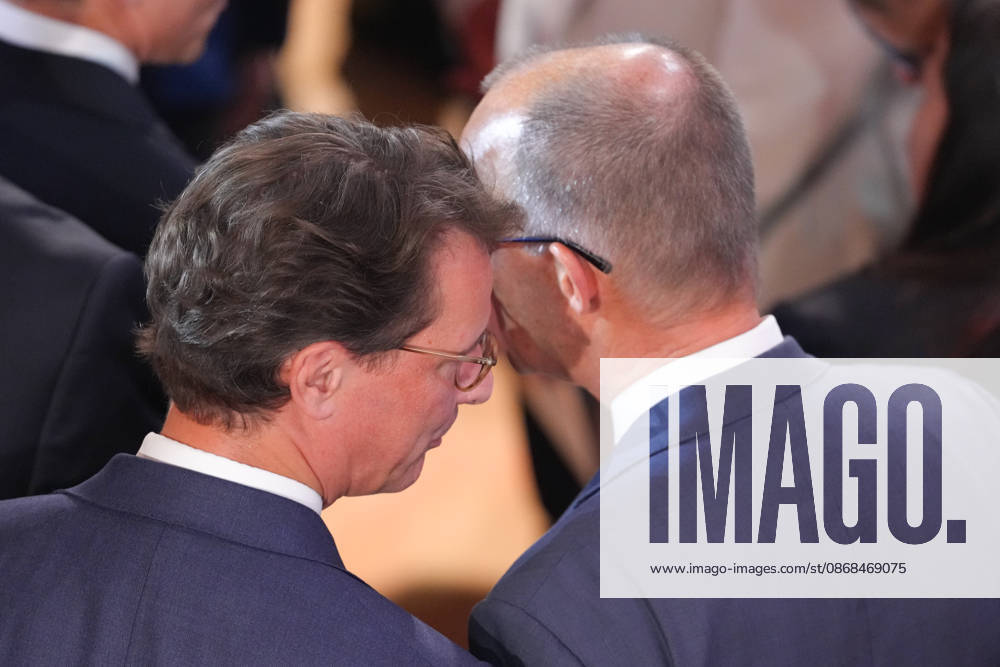German Unity Day Ceremony in Bremen: Chancellor Friedrich Merz and North Rhine-Westphalia Minister-President Hendrik Wuest in conversation after the German Unity Day ceremony at the Glocke, Bremen, October 3, 2026, Bremen, Germany