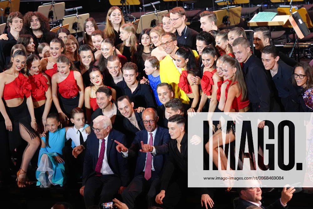 German Unity Day Ceremony in Bremen: Group photo with Chancellor Friedrich Merz and Federal President Frank Walter Steinmeier; the artists performing at the German Unity Day ceremony pose for a photo with the two heads of state after their performance, Bremen, October 3, 2026, Bremen, Bremen, Germany