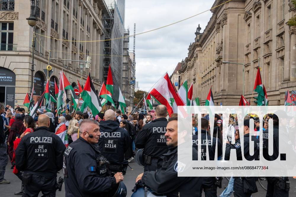 Palestinian and Pro-Palestinian Bloc at Berlin Peace Demonstration BERLIN, GERMANY OCTOBER 3, 2026: Thousands of people took part in a peace demonstration in central Berlin on German Unity Day. A coalition of peace initiatives, trade unions, and political and civil-society groups organized the protest. The demonstrators focused on military rearmament, the possible reintroduction of conscription, and Germanys military policy. The march began at the Brandenburg Gate and continued through the government district before concluding with a rally. The demonstration brought together participants expressing opposition to Germanys current and proposed military policies on a national public holiday. Berlin Germany