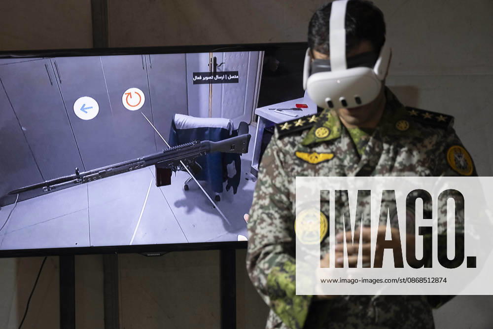 Opening Ceremony Of Second City-Square Military Training Camp An Iranian Army serviceman wears a virtual reality headset to shoot with a virtual rifle during the opening ceremony of the second city-square military training camp for self-sacrificing forces in downtown Tehran, Iran, on October 3, 2026. The camp was established by the Basij paramilitary force, with personnel from the Islamic Republic of Iran Army responsible for training the volunteers. Tehran Tehran Iran