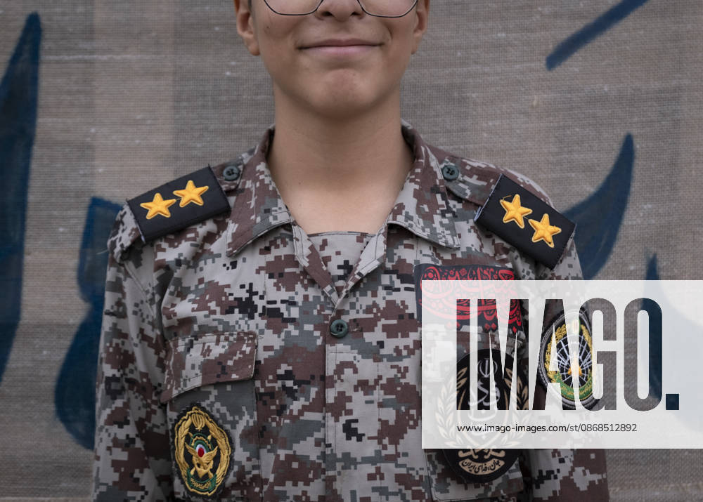 Opening Ceremony Of Second City-Square Military Training Camp An Iranian schoolboy wearing an Iranian Army military uniform smiles while standing at attention during the opening ceremony of the second city-square military training camp for self-sacrificing forces in downtown Tehran, Iran, on October 3, 2026. The camp was established by the Basij paramilitary force, with personnel from the Islamic Republic of Iran Army responsible for training the volunteers. Tehran Tehran Iran