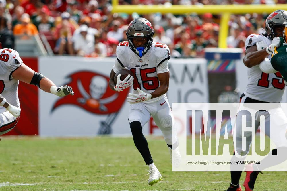 Tampa Bay Buccaneers wide receiver Tez Johnson (15) gains yards after a catch, while the Green Bay Packers play defense during the third quarter at Raymond James Stadium in Tampa on Sunday, Oct. 4, 2026. Tampa USA - ZUMAs70_ 20261004_zan_s70_052