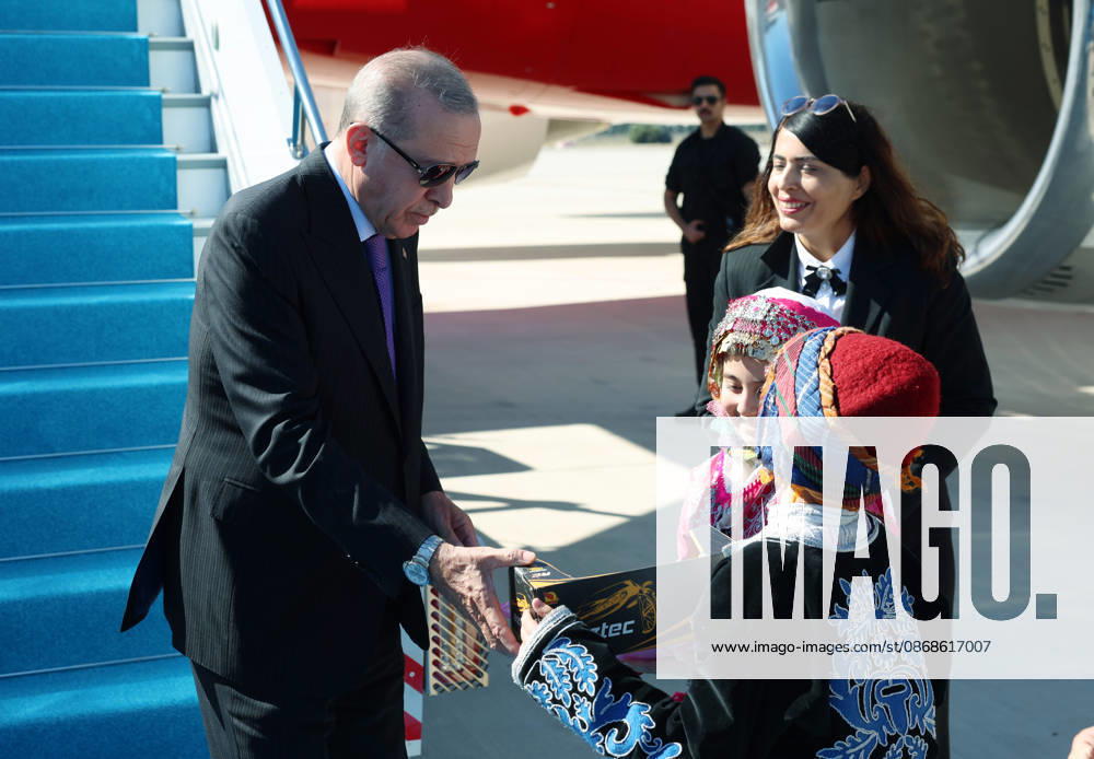 Turkish President Recep Tayyip Erdogan ANTALYA, TURKIYE - OCTOBER 05: (---- - MANDATORY CREDIT - TURKISH PRESIDENCY MURAT KULA HANDOUT - NO MARKETING NO ADVERTISING CAMPAIGNS - DISTRIBUTED AS A SERVICE TO CLIENTS----) Turkish President Recep Tayyip Erdogan is greeted by children dressed in traditional local attire upon his arrival at Antalya Airport to attend various programs and events in Antalya, Turkiye on October 05, 2026. TUR Presidency Murat Kula Anadolu Antalya Turkey. Editorial use only. Please get in touch for any other usage.
