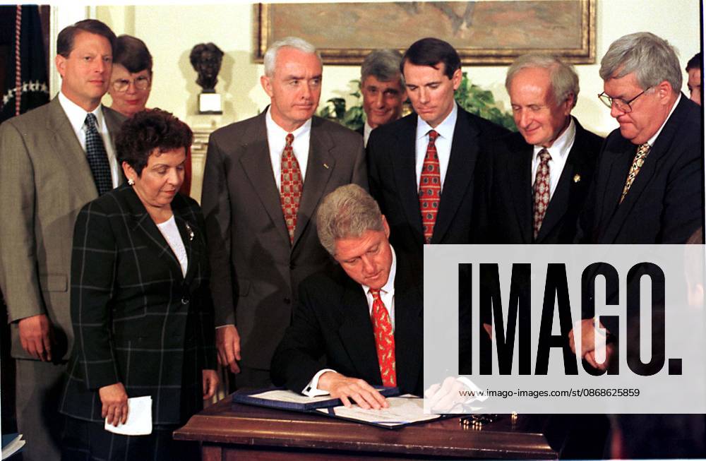 **FILE PHOTO** Dennis Hastert Has Passed Away. United States President Bill Clinton signs the Drug-Free Communities Act of 1997 at the White House in Washington, D.C. on June 27, 1997. Standing behind the President, left to right, U.S. Vice President Al Gore, U.S. Attorney General Janet Reno, U.S. Secretary of Health and Human Services (HHS) Donna Shalala, General Barry McCaffrey, U.S. Secretary of the Treasury Robert Rubin, U.S. Representative Rob Portman (Republican of Ohio), U.S. Representative Sandy Levin (Democrat of Michigan), and U.S. Representative Dennis Hastert (Republican of Illinois)..