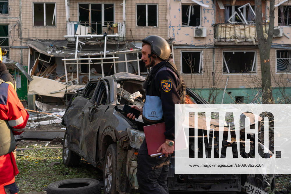 Russian missile attack on Ukraine s Kharkiv KHARKIV, UKRAINE - OCTOBER 5: Firefighters and emergency service workers operate at the site of a residential building struck by a guided bomb in Kharkiv, Ukraine on October 5, 2026. A guided bomb hit a residential building, killing at least two people and injuring over 30 others. The strike destroyed several parked vehicles and damaged more than 40 surrounding houses, with search, rescue, and cleanup operations ongoing by police, firefighters, and volunteers. Carlo Bravo Anadolu Kharkiv Ukraine. Editorial use only. Please get in touch for any other usage.