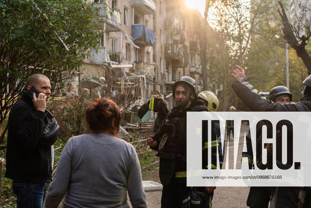 Russian missile attack on Ukraine s Kharkiv KHARKIV, UKRAINE - OCTOBER 5: Firefighters and emergency service workers operate at the site of a residential building struck by a guided bomb in Kharkiv, Ukraine on October 5, 2026. A guided bomb hit a residential building, killing at least two people and injuring over 30 others. The strike destroyed several parked vehicles and damaged more than 40 surrounding houses, with search, rescue, and cleanup operations ongoing by police, firefighters, and volunteers. Carlo Bravo Anadolu Kharkiv Ukraine. Editorial use only. Please get in touch for any other usage.