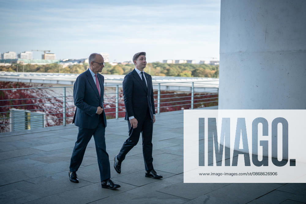 Chancellor Friedrich Merz with his guest Mindaugas Sinkeviciusius, Prime Minister of Lithuania, at the Federal Chancellery; on the terrace of the Federal Chancellery overlooking the Reichstag building, home to the Bundestag; the Federal Chancellor welcomes the Prime Minister of the Republic of Lithuania at the Federal Chancellery, Berlin, Germany; Federal Chancellery