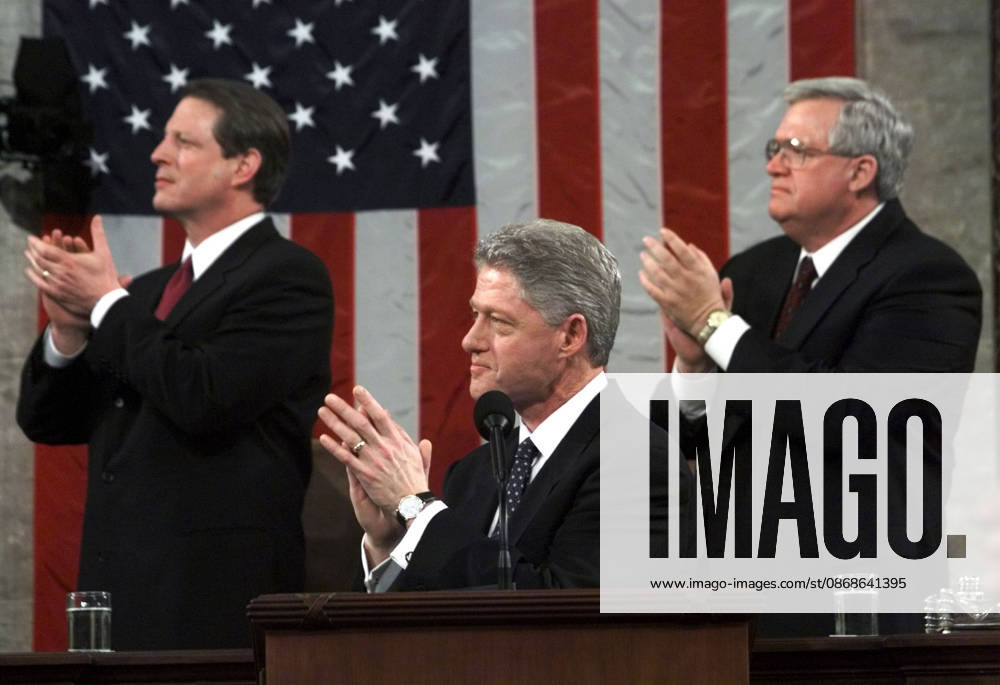 Dennis Hastert (1942 - 2026) United States President Bill Clinton is joined by U.S. Vice President Al Gore, left, and Speaker of the House Dennis Hastert (Republican of Illinois), right, as he applauds Lyn Gibson and Wei Ling Chestnut, the widows of the two Capitol policeofficers who were killed in 1998 as he begins the State of the Union Address during a Joint Session of Congress in Washington, D.C. on January 19, 1999. .Credit: Win McNamee CNP AdMedia