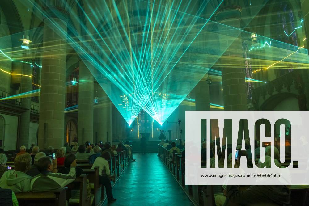 Essen Light Festival, downtown, Licht Segen Lumen Cantus, a laser show synchronized to music at Essen Cathedral, by lighting designer Manfred Olma, accompanied by live organ music, North Rhine-Westphalia, Germany, Essen Light Festival