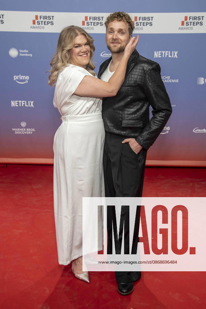 ABB FIRSTSTEPS: Gisa Flake and Knud Riepen walk the red carpet at the 2026 FIRST STEPS Awards ceremony at the Theater des Westens on October 5, 2026, in Berlin, Germany