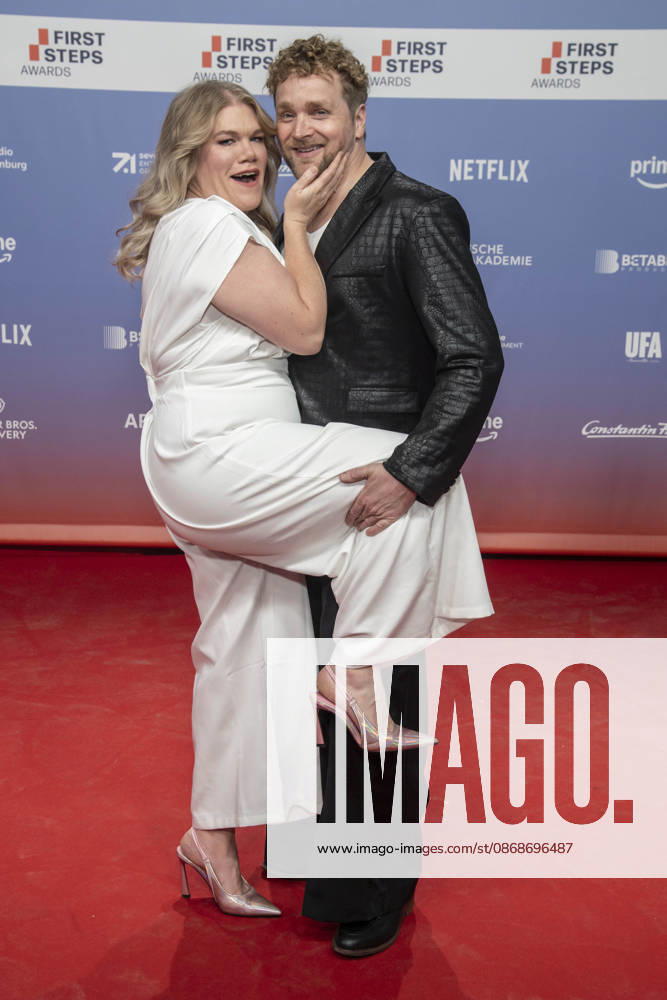 ABB FIRSTSTEPS: Gisa Flake and Knud Riepen walk the red carpet at the 2026 FIRST STEPS Awards ceremony at the Theater des Westens on October 5, 2026, in Berlin, Germany