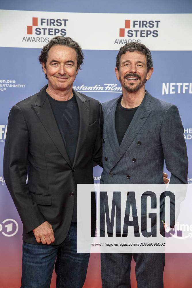 ABB FIRSTSTEPS: Martin Bachmann and Oliver Berben on the red carpet at the 2026 FIRST STEPS Awards ceremony at the Theater des Westens on October 5, 2026, in Berlin, Germany