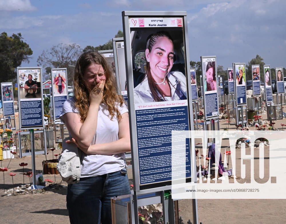 A woman weeps in front of a photo of a victim killed by Hamas on October 7, 2023, at the Nova Festival Memorial site in Re im, near the Gaza border on Monday, October 6, 2026. Israel is marking three years since the Hamas attack that killed 1,200 people and 251 were taken hostage into Gaza. JER2026100610 DEBBIExHILL