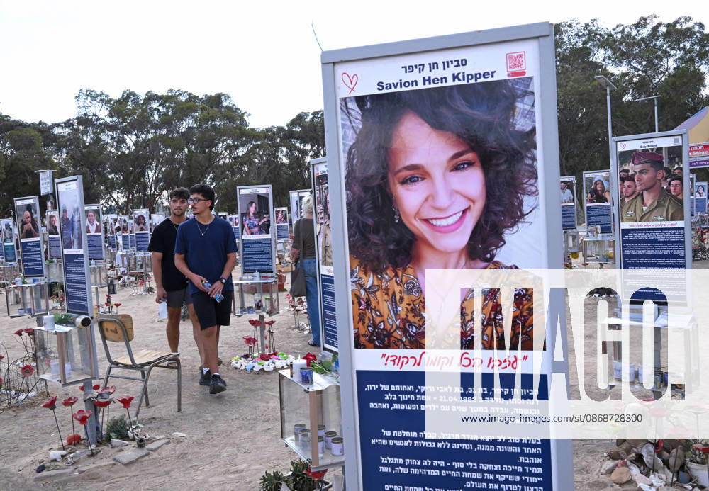 People look at photos of hundreds of victims killed by Hamas on October 7, 2023, at the Nova Festival Memorial site in Re im, near the Gaza border on Monday, October 6, 2026. Israel is marking three years since the Hamas attack that killed 1,200 people and 251 were taken hostage into Gaza. JER2026100603 DEBBIExHILL