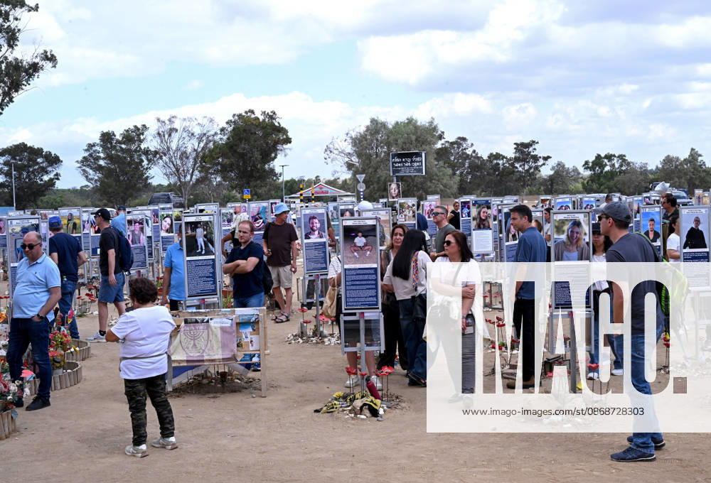 People look at photos of hundreds of victims killed by Hamas on October 7, 2023, at the Nova Festival Memorial site in Re im, near the Gaza border on Monday, October 6, 2026. Israel is marking three years since the Hamas attack that killed 1,200 people and 251 were taken hostage into Gaza. JER2026100604 DEBBIExHILL