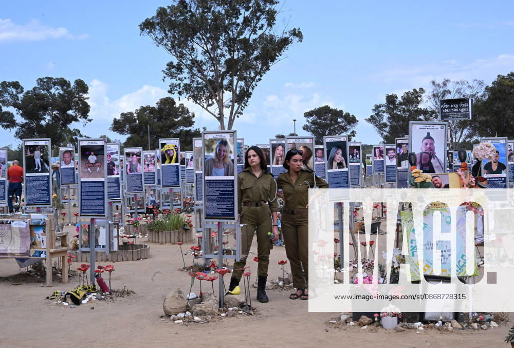 Israeli soldiers look at photos of hundreds of victims killed by Hamas on October 7, 2023, at the Nova Festival Memorial site in Re im, near the Gaza border on Monday, October 6, 2026. Israel is marking three years since the Hamas attack that killed 1,200 people and 251 were taken hostage into Gaza. JER2026100608 DEBBIExHILL