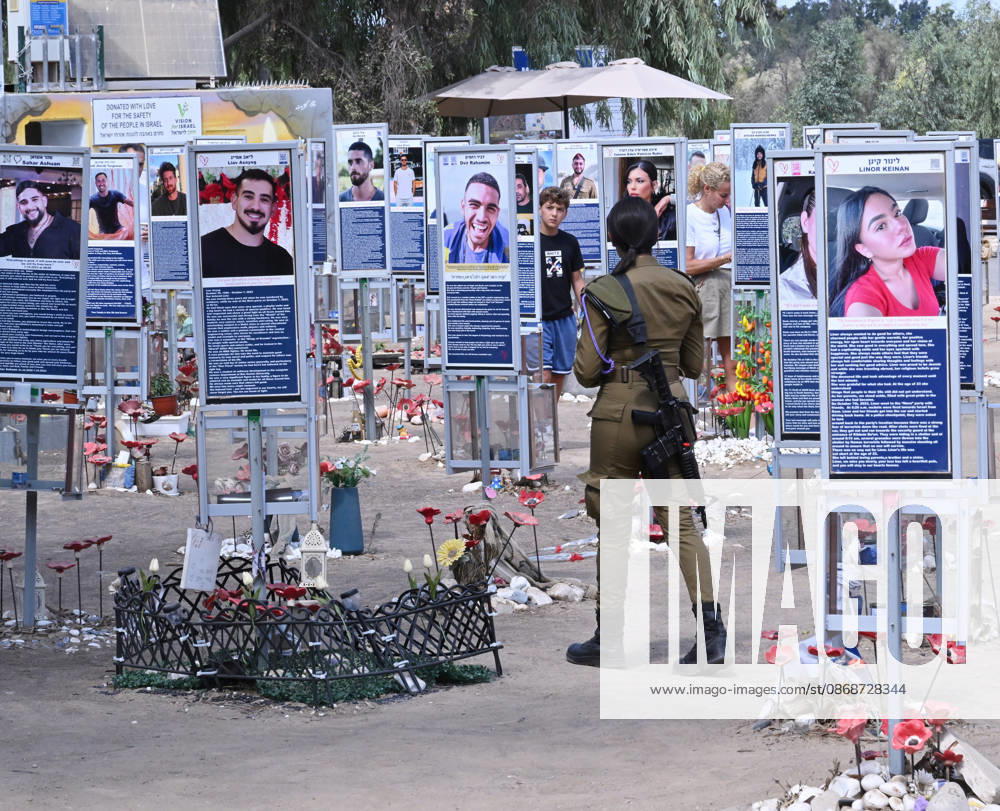 An Israeli soldier walks past photos of hundreds of victims killed by Hamas on October 7, 2023, at the Nova Festival Memorial site in Re im, near the Gaza border on Monday, October 6, 2026. Israel is marking three years since the Hamas attack that killed 1,200 people and 251 were taken hostage into Gaza. JER2026100613 DEBBIExHILL