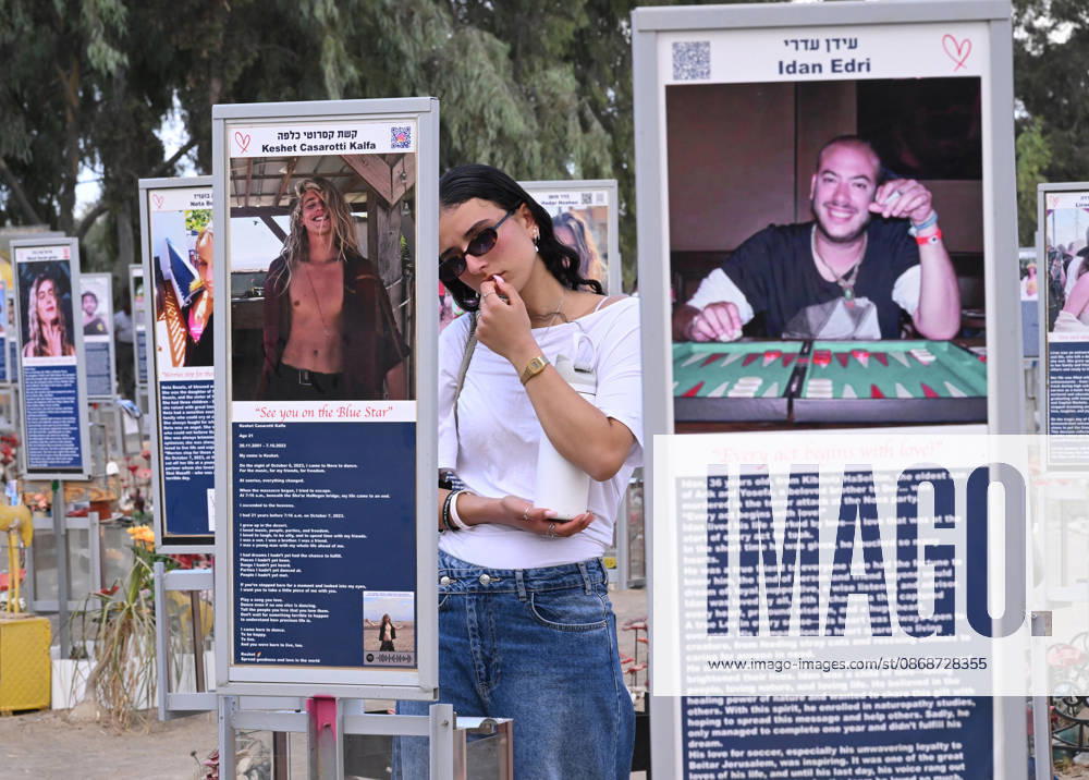 A woman mourns near a photo of a victim killed by Hamas on October 7, 2023, at the Nova Festival Memorial site in Re im, near the Gaza border on Monday, October 6, 2026. Israel is marking three years since the Hamas attack that killed 1,200 people and 251 were taken hostage into Gaza. JER2026100615 DEBBIExHILL