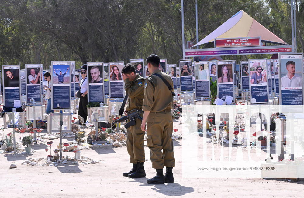 An Israeli soldier mourns near photos of hundreds of victims killed by Hamas on October 7, 2023, at the Nova Festival Memorial site in Re im, near the Gaza border on Monday, October 6, 2026. Israel is marking three years since the Hamas attack that killed 1,200 people and 251 were taken hostage into Gaza. JER2026100616 DEBBIExHILL