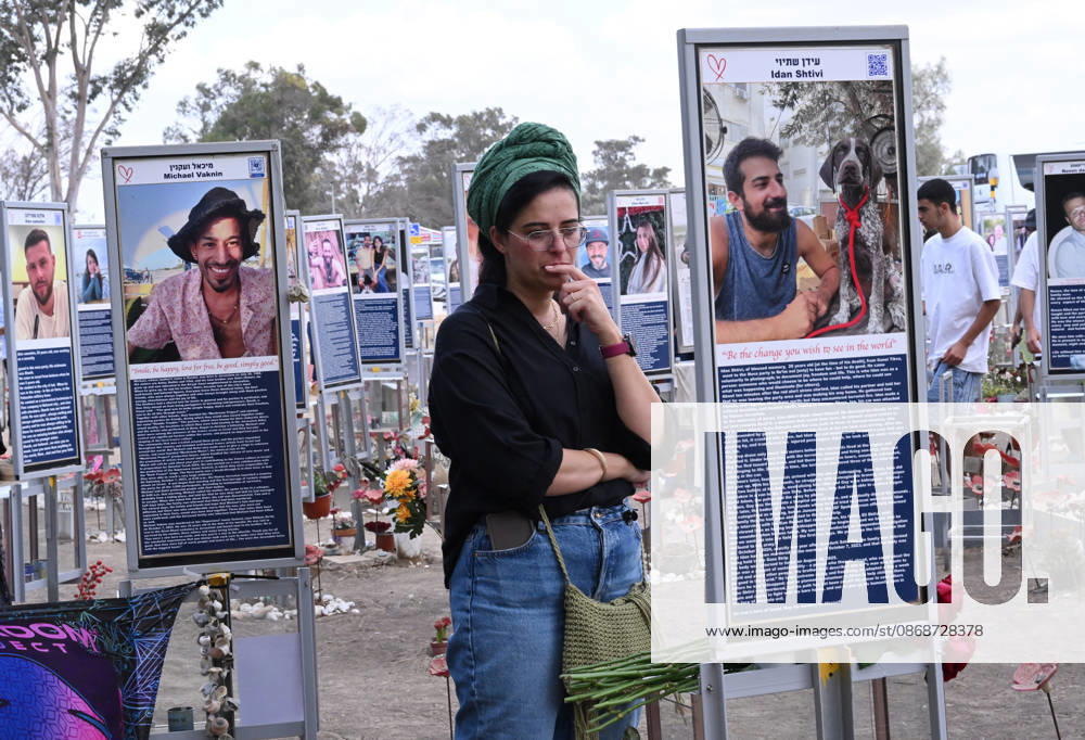 People look at photos of hundreds of victims killed by Hamas on October 7, 2023, at the Nova Festival Memorial site in Re im, near the Gaza border on Monday, October 6, 2026. Israel is marking three years since the Hamas attack that killed 1,200 people and 251 were taken hostage into Gaza. JER2026100617 DEBBIExHILL