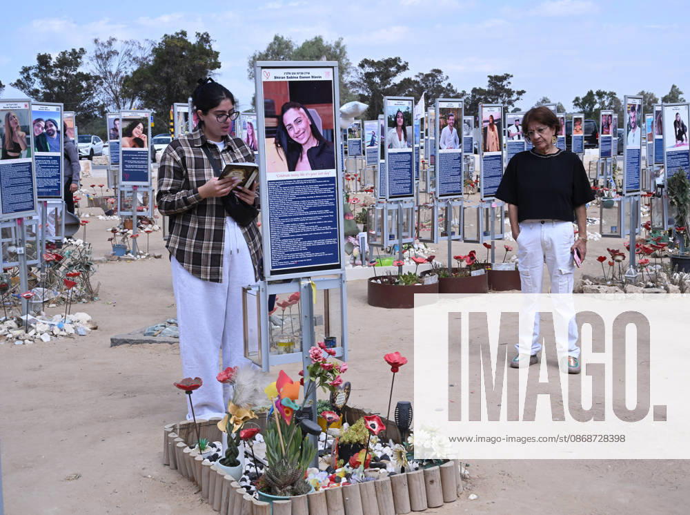An Israeli woman prays in front of a photo of a victim killed by Hamas on October 7, 2023, at the Nova Festival Memorial site in Re im, near the Gaza border on Monday, October 6, 2026. Israel is marking three years since the Hamas attack that killed 1,200 people and 251 were taken hostage into Gaza. JER2026100619 DEBBIExHILL