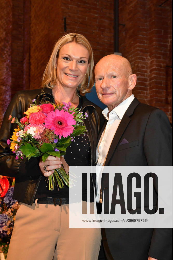 Maria Höfl Riesch and Johann Schrempf at the presentation of the Bavarian State Medal for Social Merit at the All Saints Court Church, Residenz on October 6, 2026, in Munich. Maria Riesch and Johann Schrempf attend the presentation of the Bavarian State Medal for Social Mer