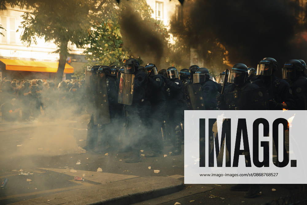 Paris Students Protest Education Conditions Riot police advance through smoke during clashes with demonstrators in Paris, France, on October 6, 2026. France s Interior Ministry said 256,000 people marched nationwide, including 56,000 in Paris, during the student-led day of action over school conditions. High school students called for more education funding and staff, smaller classes and improved facilities, with teachers, parents and unions joining demonstrations. Paris Ile de France France