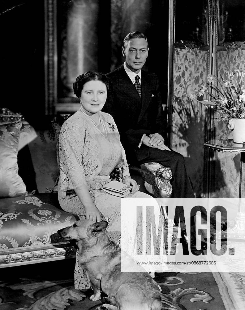 Their Majesties King George VI And Queen Elizabeth Royal Silver Wedding Photograph -- This latest photograph of the King and Queen was take in the blue drawing room on the first floor of Buckingham Palace. With them is their Corgi dog called Crackers . April 20, 1948. (Photo by Baron, Camera Press).