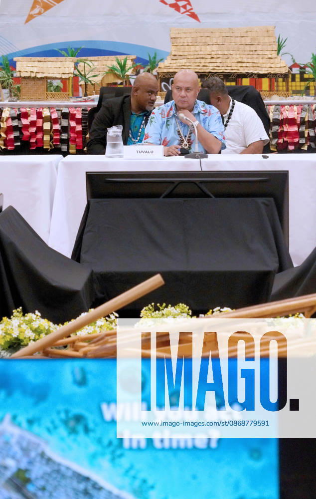 Tuvaluan Prime Minister FELETI TEO addresses attendees at the Pre-COP31 Leaders event in Funafuti, Tuvalu. A monitor in the foreground displays the question Will you act in time? to the audience. Funafuti Tuvalu - ZUMA 20261006_int_h213_037