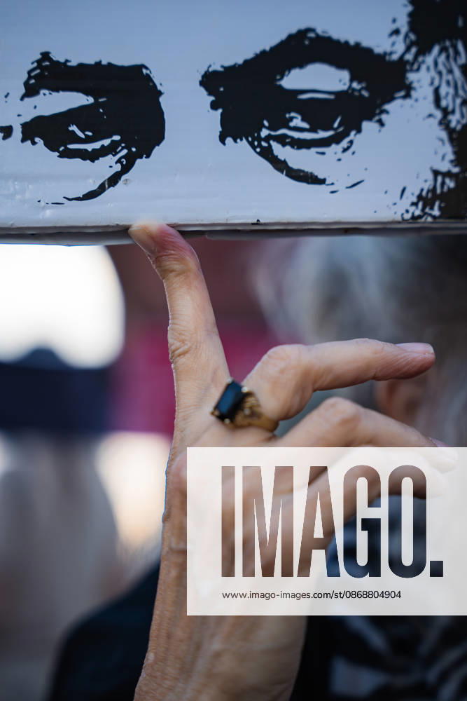 A sign depicting Benjamin Netanyahu is held up by a demonstrator at the beach in protest against the Israeli government on the third anniversary of October 7th. Tel Aviv Israel - ZUMAg280 20261007_znp_g280_003