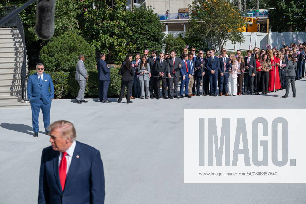 Sen. TED CRUZ and visitors look on as President DONALD TRUMP speaks to reporters on the South Lawn of the White House before departing for San Antonio, Texas. Washington United States - ZUMAk206 20261007_znp_k206_005