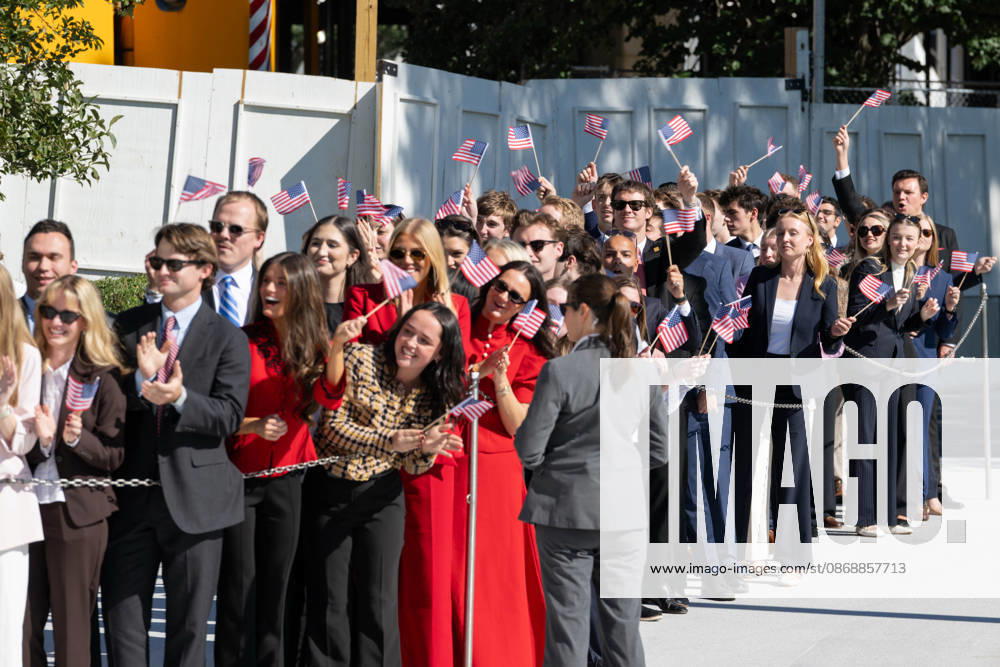 Visitors look on as President DONALD TRUMP speaks to reporters on the South Lawn of the White House before departing for San Antonio, Texas. Washington United States - ZUMAk206 20261007_znp_k206_024