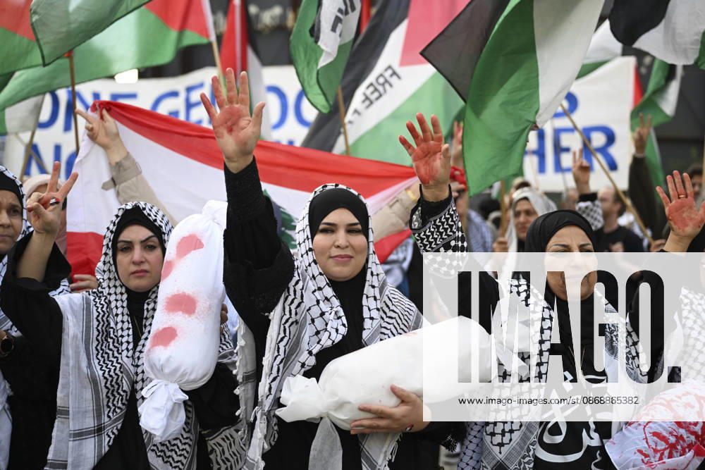 Police in Berlin intervened in demonstrations in support of Palestinians BERLIN, GERMANY - OCTOBER 7: Demonstrators hold toy dolls wrapped in white shrouds to symbolize Palestinian children killed in Israeli attacks, during a pro-Palestine rally organized by Palestinian associations at the intersection of Zimmer and Friedrich streets in Berlin, Germany on October 7, 2026. Halil Sagirkaya Anadolu Berlin Germany. Editorial use only. Please get in touch for any other usage.