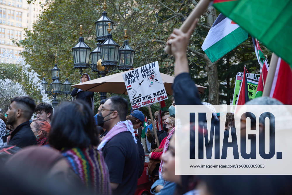 Palestinian flags wave above demonstrators during a pro-Palestinian rally at City Hall Park in New York City, New York. New York USA - ZUMAs237 20261007_aap_s237_003