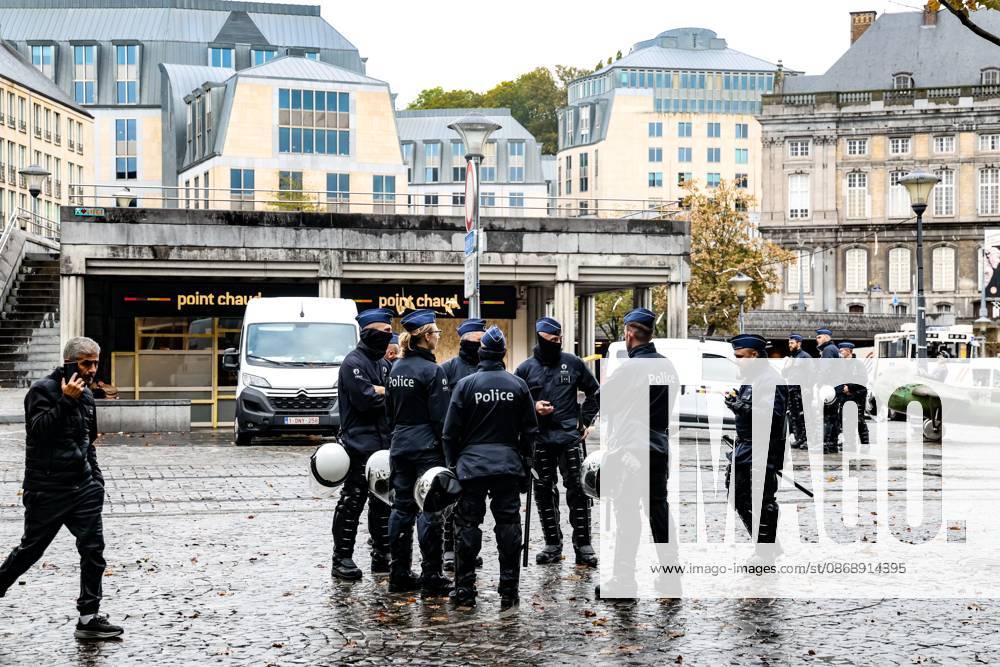%items Police pictured place Saint-Lambert in Liege city center, as a protest against education reforms and budget cuts has been going on for several days, on Thursday 8 October 2026. For several days protests turned violent, mainly due to rioters who vandalize the city centre and face police. The city of Liege announced a ban of gathering of more than three minors on public space, unless with a responsible adult, to prevent the gathering of rioters who have nothing to do with the original movement. BRUNOxFAHY 189130039