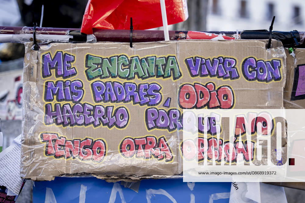 Protesters at Sol Square Stand by Their Demands for Housing A banner reading I love living with my parents, but I hate having to do it because I have no other choice during the housing protest at Puerta del Sol on October 8, 2026, in Madrid, Spain. The encampment at Sol has spilled over into the square, and the protesters are maintaining their demands against evictions and exorbitant rents. The Official State Gazette (BOE) published yesterday, October 7, the new version of the housing and rent decrees that the Council of Ministers had approved the previous day OCTOBER 8, 2026 A Pé Madrid, Madrid, Spain