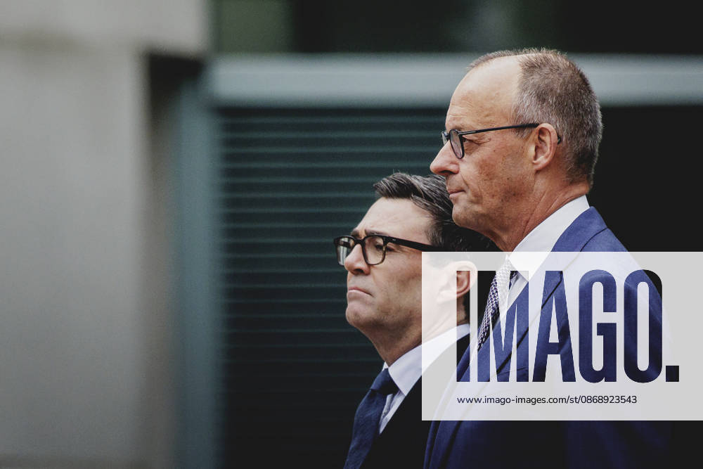 R. L. Friedrich Merz (CDU), Chancellor of Germany, and Andrew Burnham, Prime Minister of the United Kingdom, photographed during a reception with military honors at the Federal Chancellery in Berlin, October 8, 2026, Berlin, Germany