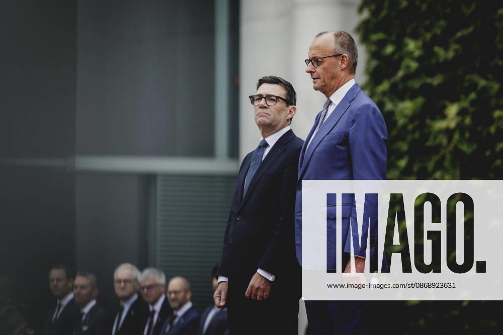 R. L. Friedrich Merz (CDU), Chancellor of Germany, and Andrew Burnham, Prime Minister of the United Kingdom, photographed during a reception with military honors at the Federal Chancellery in Berlin, October 8, 2026, Berlin, Germany