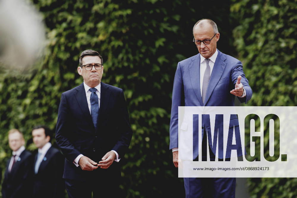 R. L. Friedrich Merz of the CDU, Chancellor of Germany, and Andrew Burnham, Prime Minister of the United Kingdom, photographed during a reception with military honors at the Federal Chancellery in Berlin, October 8, 2026, Berlin, Germany