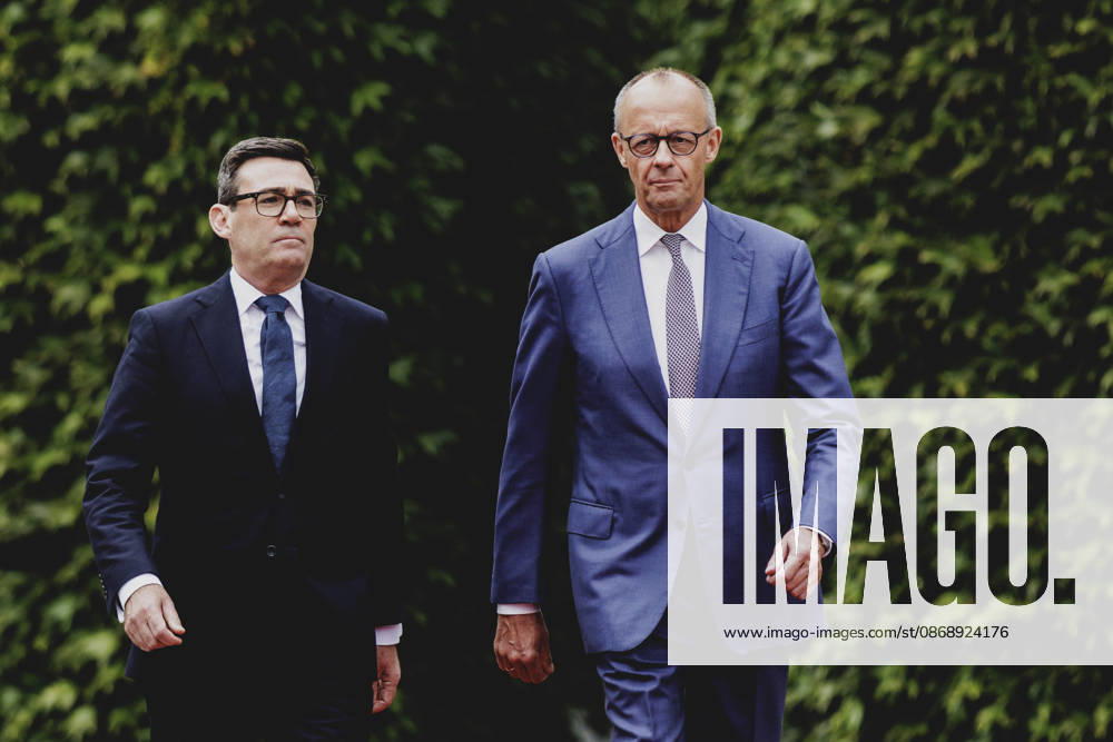 R. L. Friedrich Merz of the CDU, Chancellor of Germany, and Andrew Burnham, Prime Minister of the United Kingdom, photographed during a reception with military honors at the Federal Chancellery in Berlin, October 8, 2026, Berlin, Germany