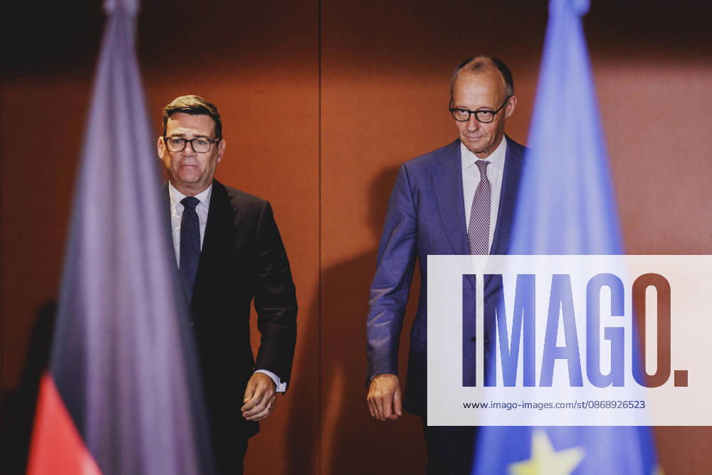 R L Friedrich Merz of the CDU, Chancellor of Germany, and Andrew Burnham, Prime Minister of the United Kingdom, photographed before a statement in Berlin, October 8, 2026, Berlin, Germany