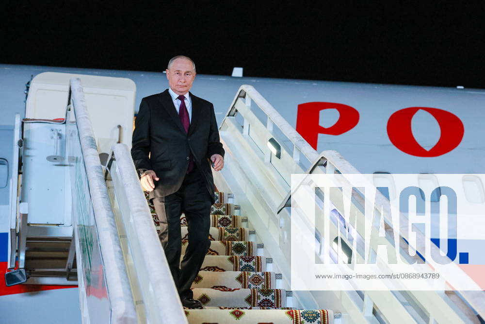 TURKMENISTAN, BALKAN PROVINCE - OCTOBER 8, 2026: Vladimir Putin, President of Russia, steps off his plane ahead of a meeting of the CIS (Commonwealth of Independent States) Council of Heads of State in Turkmenbasy. Vladimir Smirnov TASS 98954848