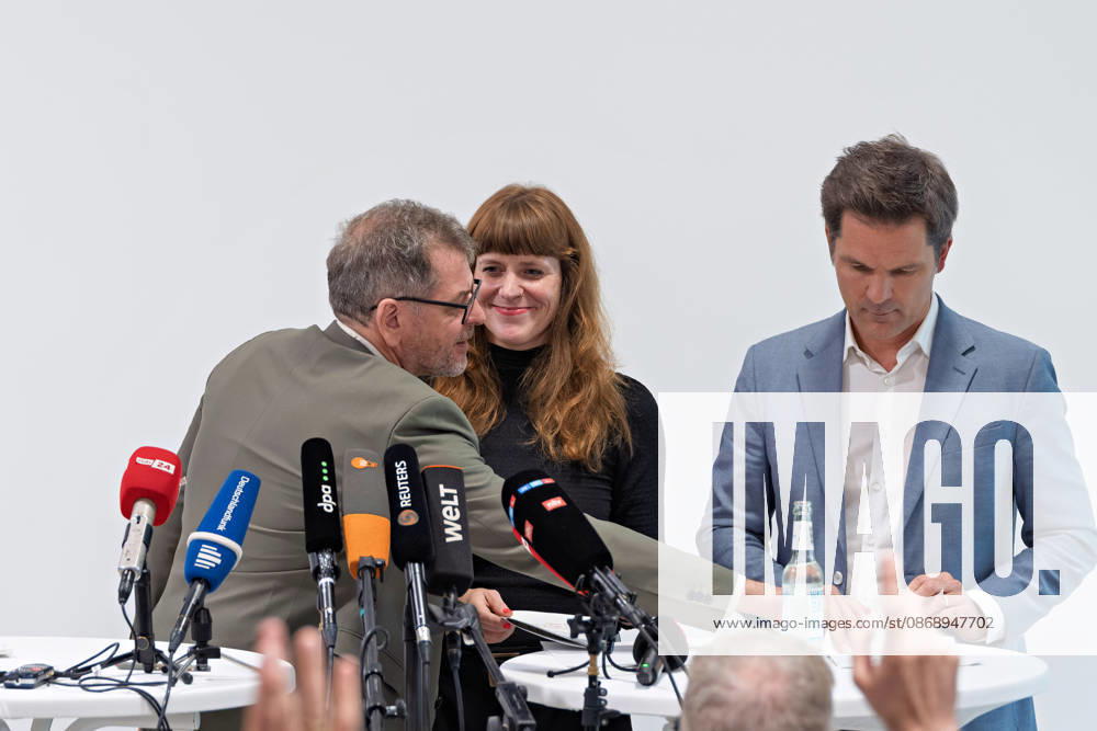 Berlin, October 8, 2026: Werner Graf of Alliance 90 The Greens (left) speaks during a joint press conference following the conclusion of preliminary talks between their parties in the foyer of the Haus der Statistik with Kerstin Wolter Ehling of The Left (center), and Steffen Krach of the SPD (right). Press conference by The Left, the Greens, and the SPD in Berlin