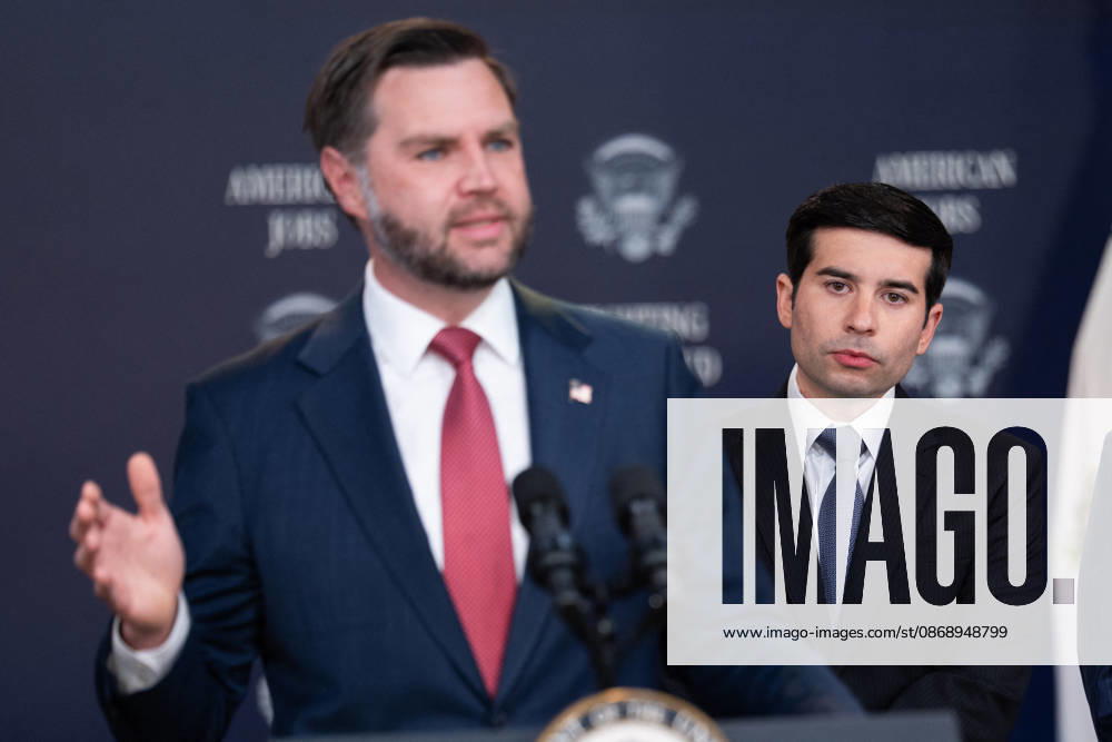 JD Vance During Immigration Program Announcement - Washington Secretary of Labor Keith Sonderling watches Vice President JD Vance give remarks during an announcement in the South Court Auditorium of the Eisenhower Executive Office Building at the White House in Washington, DC, US, on Thursday, Oct. 8, 2026. The Trump administration said Thursday that it would suspend an immigration program for multiple tech firms, including Microsoft Corp., alleging widespread abuse of a worker visa system. Photo by Aaron Schwartz Pool ABACAPRESS.COM Washington District of Columbia