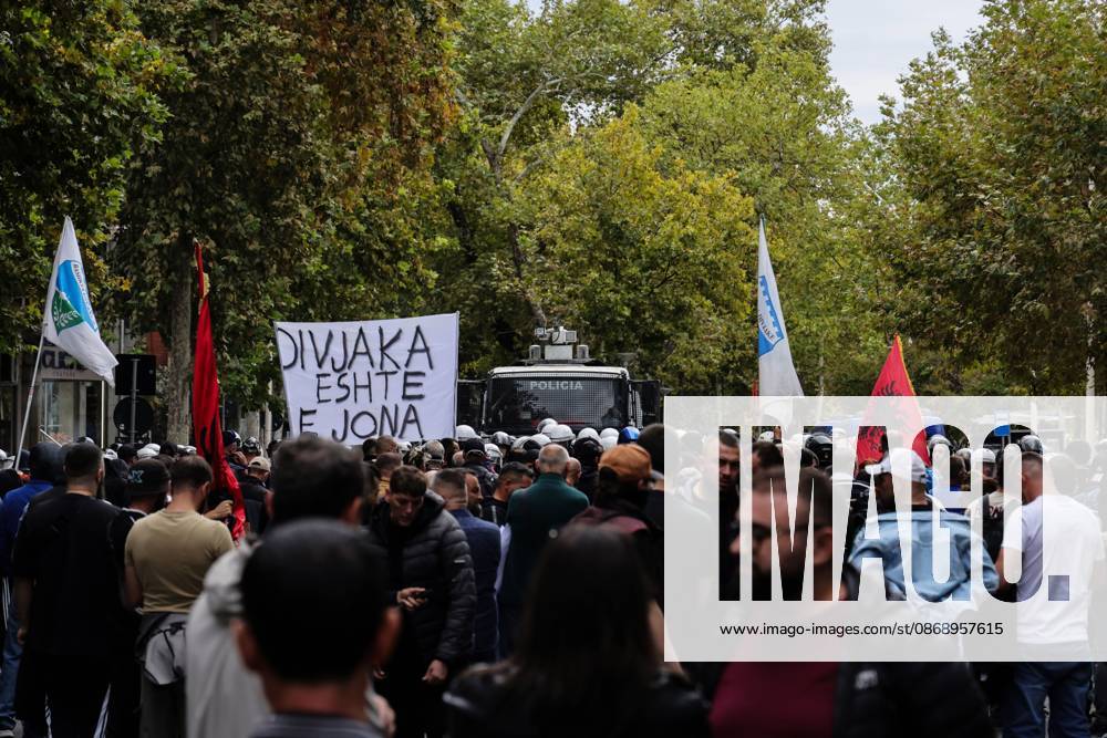 TIRANA, ALBANIA †OCTOBER 8, 2026: Citizens, local activists and supporters of the opposition gather outside the Albanian Parliament as lawmakers debate and vote on proposed changes to the countryâ€⠢s administrative-territorial division. The reform proposes reducing the number of municipalities from 61 to 46 through the merger of 15 existing municipalities, including Divjako«, PolioÂßan and Memaliaj. Residents and representatives of municipalities affected by the proposed changes joined the protest, calling for their municipalities to be preserved. Protesters displayed banners and slogans opposing the proposed mergers. Tensions escalated between protesters and police, with reports of eggs and - ZUMAq101 20261008_zna_q101_060