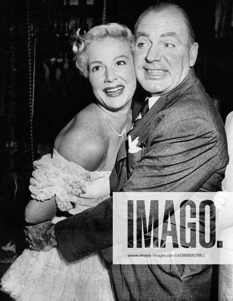**. They re old friends, want into this cheek-to-cheek clinch when they met unexpectedly on the sat. March 8, 1951. (Photo by Reuterphoto).